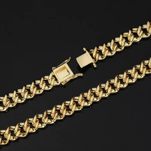 Upgrade your look with the Yellow Gold Iced Prong Miami Cuban Link Chain - 9mm. This stunning piece features a thick, high-quality Yellow Gold plating, ensuring a lasting, luxurious shine that never fades. The VVS Simulated Diamonds have been expertly cut to offer a high refractive index, delivering that signature bling bling look. Whether you're going for a formal vibe or adding some flair to a casual outfit, this chain brings a touch of elegance and style. It's the perfect choice for any Hip Hop fan who values both durability and affordability. Fade-proof, scratch-resistant, and waterproof, it's designed to withstand the test of time.