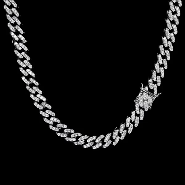 The White Gold Iced Prong Miami Cuban Link Chain - 9mm offers a sleek, contemporary look with its thick, high-quality White Gold plating. The chain's VVS Simulated Diamonds are precisely cut for maximum brilliance, providing that dazzling bling in any setting. This piece is versatile enough for both casual and formal occasions, adding a modern edge to any ensemble. With its scratch-resistant, non-fading design, this chain is a durable yet stylish addition to your collection. Ideal for those who want high-end aesthetics without the high-end price tag.