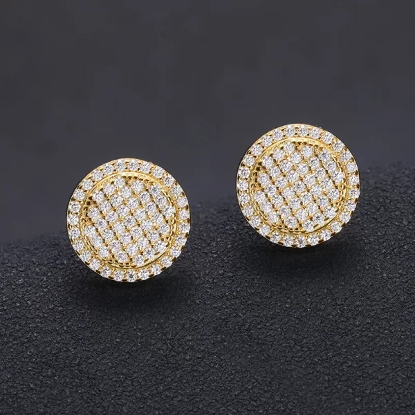 Add a touch of classic elegance with these 925S Moissanite Circle Stud Earrings. Measuring 12mm, these earrings feature stunning moissanite stones set in 925 sterling silver and coated in Yellow Gold. Perfect for formal occasions or elevating your everyday look, these studs offer unmatched brilliance and a timeless style that pairs perfectly with any Hip Hop collection.