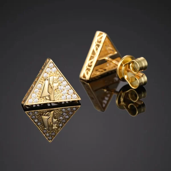 Embrace ancient mystique with the Yellow Gold 925S Moissanite Egypt Triangle Stud Earring. This pyramid-inspired design, plated in Yellow Gold, shines with Moissanite stones that rival diamonds. Crafted from hypoallergenic 925 sterling silver, this earring is perfect for adding a unique twist to your Hip Hop wardrobe. The Yellow Gold finish adds a luxurious touch, making it a great choice for both formal and casual settings. Stand out with this blend of elegance and boldness in your jewelry collection.