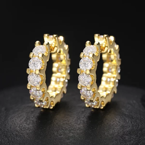 For a bold statement, look no further than the 925S Moissanite Prong Hoop Earring. This 22mm hoop is adorned with high-quality moissanite stones, set in a 925 sterling silver prong setting that maximizes sparkle and durability. With its luxurious Yellow Gold plating, these hoops are perfect for those who want to add serious shine to their Hip Hop-inspired style.