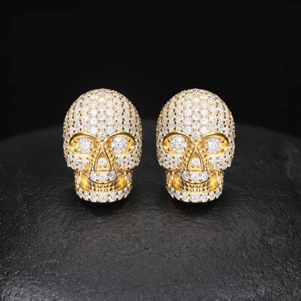 Showcase your edgy Hip Hop style with the Yellow Gold 925S Moissanite Skull Stud Earring. Featuring intricately detailed Moissanite skulls, this unique earring adds a bold twist to your accessory game. The Yellow Gold plating provides an extra layer of brilliance, making it perfect for those who want to stand out. Hypoallergenic and built to last, it¡¯s crafted from 925 sterling silver with Moissanite stones that rival the shine of real diamonds. This Yellow Gold piece is both fashionable and durable, perfect for expressing your bold personality.