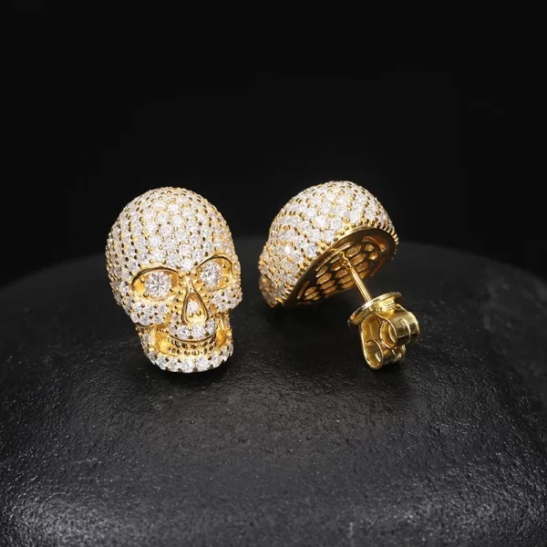 Showcase your edgy Hip Hop style with the Yellow Gold 925S Moissanite Skull Stud Earring. Featuring intricately detailed Moissanite skulls, this unique earring adds a bold twist to your accessory game. The Yellow Gold plating provides an extra layer of brilliance, making it perfect for those who want to stand out. Hypoallergenic and built to last, it¡¯s crafted from 925 sterling silver with Moissanite stones that rival the shine of real diamonds. This Yellow Gold piece is both fashionable and durable, perfect for expressing your bold personality.