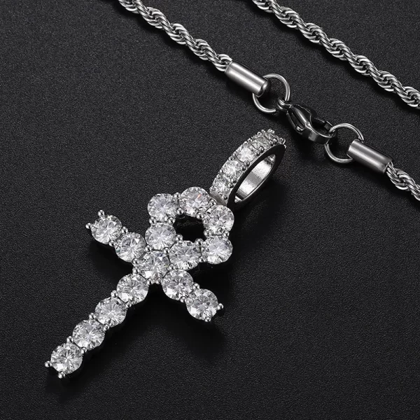 The White Gold 925SS Moissanite Ankh Cross Pendant symbolizes eternal life and style. With Moissanite stones and a sterling silver base, this hypoallergenic, waterproof piece shines with Hip Hop elegance.