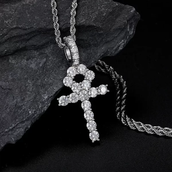 The White Gold 925SS Moissanite Ankh Cross Pendant symbolizes eternal life and style. With Moissanite stones and a sterling silver base, this hypoallergenic, waterproof piece shines with Hip Hop elegance.