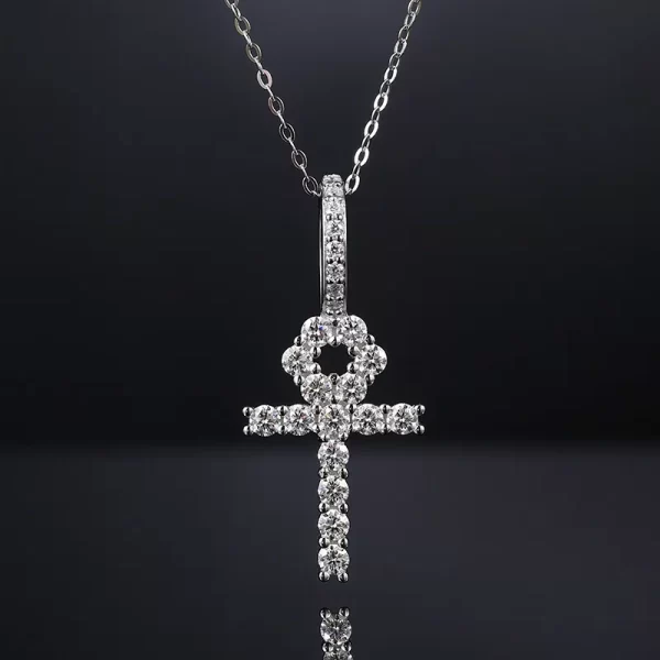 The White Gold 925SS Moissanite Ankh Cross Pendant merges ancient symbolism with modern luxury. Crafted in 925 sterling silver and embellished with brilliant Moissanite stones, this pendant is a powerful symbol of eternal life, blending Egyptian heritage with contemporary style. Its hypoallergenic, scratch-resistant, and waterproof design ensures it can be worn comfortably throughout the day while maintaining its brilliance. Whether you're attending a special event or simply looking for a standout piece, this Ankh cross pendant offers both meaning and elegance, making it a versatile accessory for any occasion.