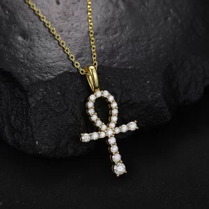 Embrace ancient symbolism with the 925SS Moissanite Ankh Cross Pendant. This pendant, made from sterling silver and adorned with Moissanite stones, symbolizes eternal life and strength. Its sleek design, enhanced by the shimmering stones, makes it a powerful and stylish statement piece. Hypoallergenic and waterproof, this pendant is perfect for those seeking to merge ancient meaning with modern fashion, all while staying true to Hip Hop culture.