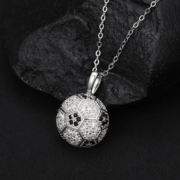 The White Gold 925SS Moissanite Soccer Pendant offers a sleek and stylish way to show your love for soccer. With its Moissanite stones and white gold finish, this hypoallergenic and waterproof pendant is perfect for adding a sporty yet luxurious touch to any Hip Hop outfit.