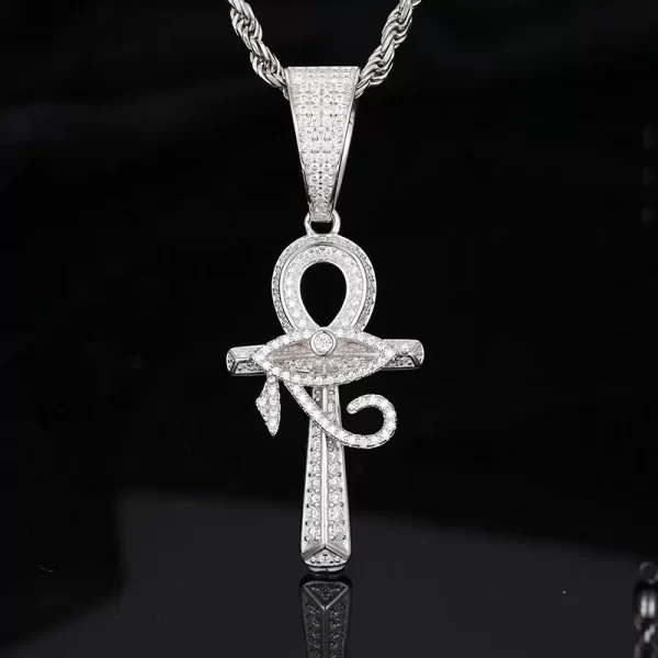 The White Gold 925SS Moissanite Eye of Ra Ankh Cross Pendant merges ancient Egyptian symbolism with modern Hip Hop design. Featuring Moissanite stones, this hypoallergenic and waterproof pendant is perfect for those seeking meaningful style with everyday wear.