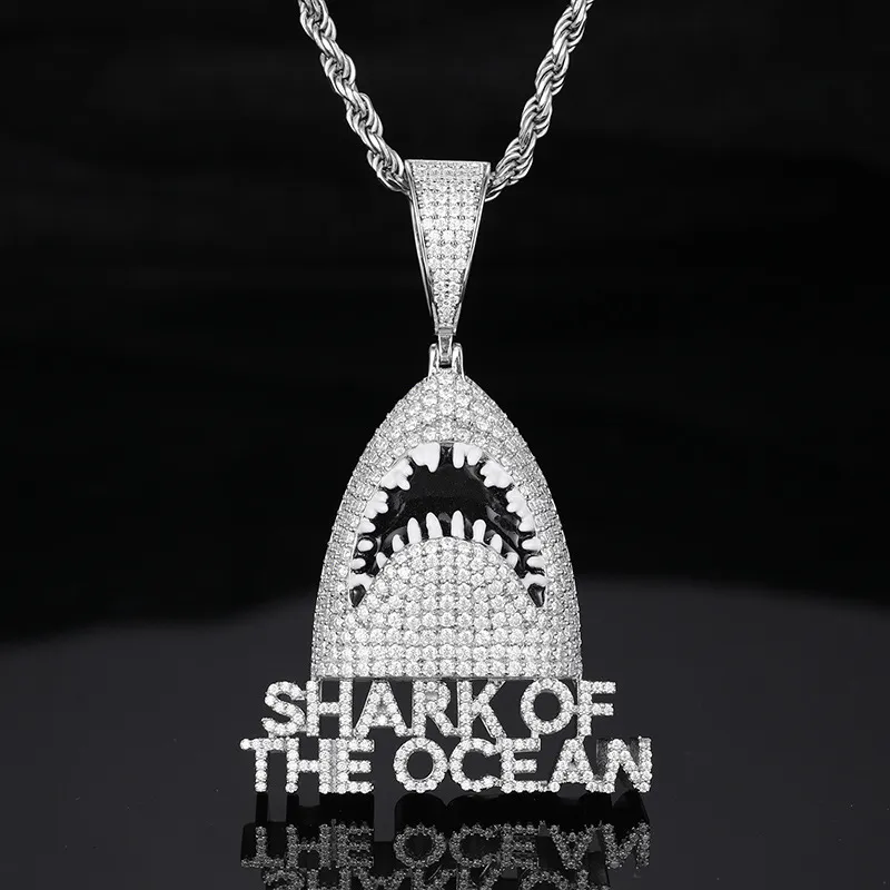 The White Gold 925SS Moissanite Shark Pendant captures the energy of the ocean in a luxurious Hip Hop accessory. Crafted with Moissanite stones, this hypoallergenic, waterproof pendant is perfect for making a statement.