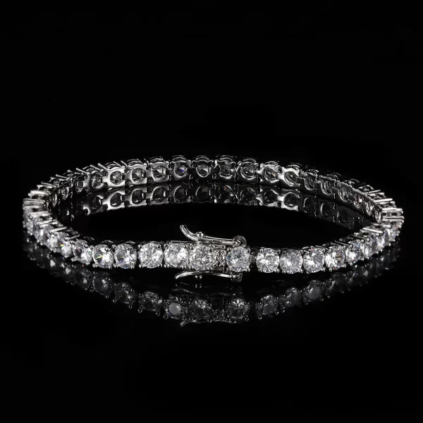 Add a touch of elegance to your look with the Iced Prong Tennis Bracelet in White Gold - 3mm. This sleek bracelet is designed with prong-set VVS Simulated Diamonds, delivering maximum brilliance and shine. The slim 3mm design makes it perfect for layering or wearing solo, adding the right amount of bling to elevate your style. Finished with White Gold Plating, it¡¯s both luxurious and durable.