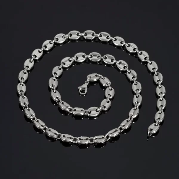 Elevate your everyday style with the Stainless Steel Mariner Link Chain in White Gold. Built for both durability and fashion, this 5-11mm chain offers sleek sophistication with its high-polish White Gold finish. Whether layered or worn as a standalone piece, the varying widths ensure versatility and modern appeal. Perfect for casual wear or dressing up, this White Gold chain brings a refined elegance that complements any outfit, making it a staple in your collection.