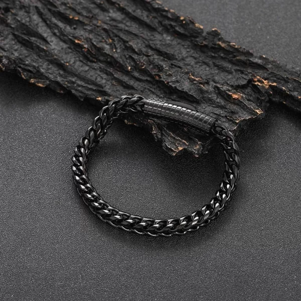 The Stainless Steel Rope Bracelet in Black Gold - 6mm is designed for those who appreciate bold and refined style. This bracelet features a sleek rope design, crafted from Stainless Steel and finished with a durable Black Gold Plating. Its 6mm width makes it a versatile piece that can be worn alone or layered with other accessories for a standout look. Whether you're dressing up or keeping it casual, this bracelet is perfect for Hip Hop lovers who want to add an edge to their style.