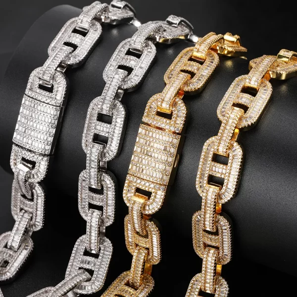 Upgrade your collection with the Iced Square Mariner Link Chain in White Gold. Featuring prong-set VVS Simulated Diamonds and a sleek 15mm mariner link design, this chain brings a modern twist to a classic style. The White Gold finish adds an elegant touch, making it perfect for those who want to elevate their look with a bit of luxury. Whether you¡¯re dressing up for an event or adding a touch of shine to your everyday style, this White Gold chain guarantees to stand out in any crowd.