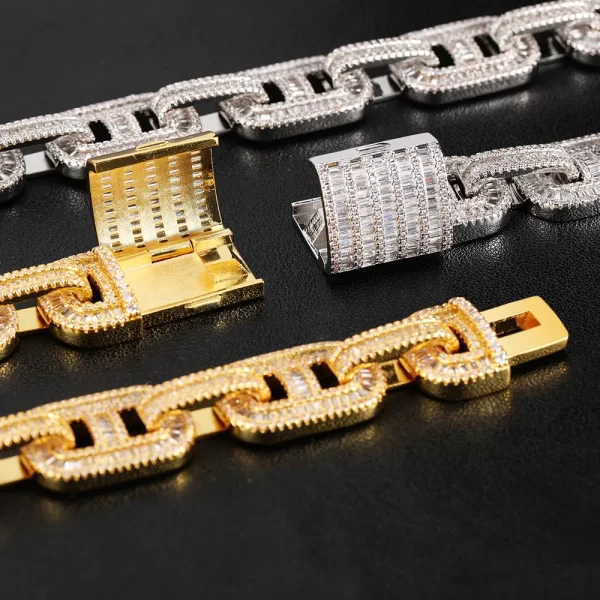 Make a bold statement with the Iced Square Mariner Link Chain in Yellow Gold. This 15mm chain combines a sturdy mariner design with dazzling VVS Simulated Diamonds, all finished with a luxurious Yellow Gold plating. The square mariner links add a modern touch, making it perfect for those who want a standout accessory for both casual and formal events. Its durable design ensures long-lasting wear, while the Yellow Gold finish brings elegance and shine to any look, making it a go-to piece for those who want to shine with confidence.