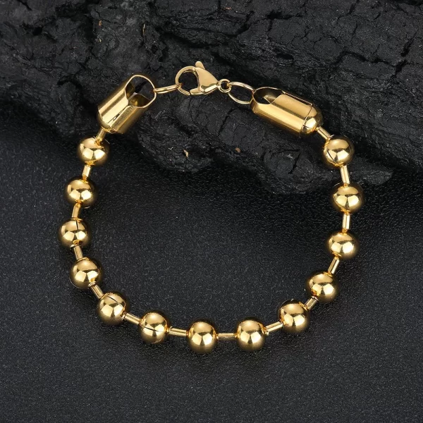 The Stainless Steel 18K Gold Beaded Bracelet in Yellow Gold - 8mm combines timeless elegance with modern Hip Hop style. This bracelet features classic round beads crafted from durable stainless steel, finished with luxurious 18K Yellow Gold Plating. Its sleek 8mm design makes it a versatile accessory, perfect for both casual and formal occasions. The gold-plated finish adds a refined touch, ensuring that this bracelet is a standout piece in any Hip Hop collection.