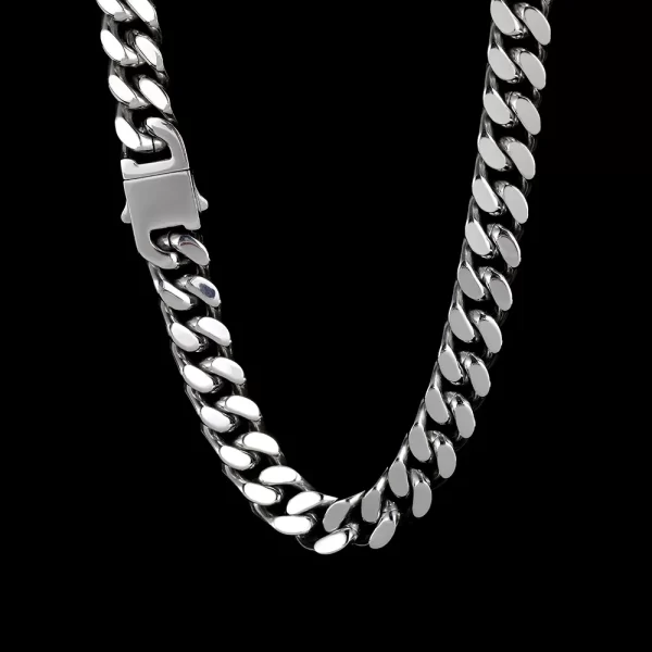 The White Gold Square Stainless Steel Cuban Link Chain is crafted to provide durability with a touch of elegance. Its 5-15mm links are plated with White Gold, giving the chain a sleek, modern finish. The square design sets it apart from traditional Cuban links, while VVS Simulated Diamonds add a high-end sparkle. Whether for casual wear or formal occasions, this White Gold chain is a versatile accessory that delivers both strength and style without compromising luxury.