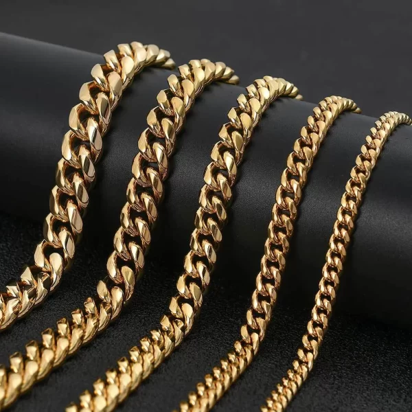 Make a bold statement with the Stainless Steel 18K Gold Cuban Link Chain in Yellow Gold. This thick Cuban Link Chain is crafted from high-grade stainless steel and finished with luxurious 18K Yellow Gold Plating. The 8¨C14mm wide links give it a substantial, high-end look, while the VVS Simulated Diamonds provide a dazzling shine. Designed for those who want a perfect mix of durability and luxury, this chain is versatile enough to complement both street style and formal wear, making it an essential accessory for any Hip Hop enthusiast.