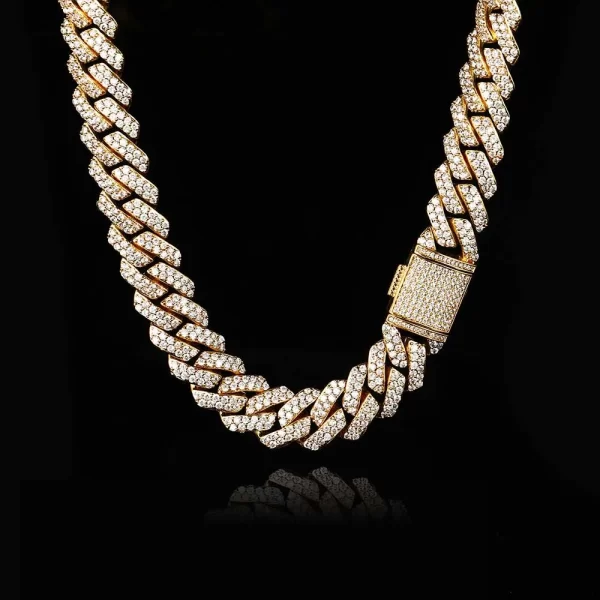 Shine bright with the Iced Prong Diamond Miami Cuban Link Chain in Yellow Gold. This 15mm Cuban link chain is designed with prong-set VVS Simulated Diamonds for maximum brilliance, paired with a bold Yellow Gold finish. Whether you¡¯re heading to a casual outing or a formal event, the wide 15mm design ensures durability and style. The Yellow Gold plating adds a touch of luxury and elegance, making it the perfect accessory for those who want to make a statement. Its gleaming finish guarantees you¡¯ll turn heads wherever you go.