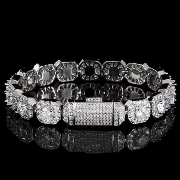 Shine bright with the Iced Square Tennis Bracelet in White Gold - 10/12mm. The sleek square-set VVS Simulated Diamonds, combined with a White Gold finish, make this bracelet the perfect accessory for those who love the luxurious, bold style of Hip Hop fashion.