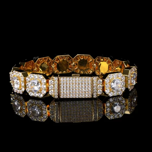 Shine bright with the Iced Square Tennis Bracelet in Yellow Gold - 10/12mm. Featuring VVS Simulated Diamonds set in a square prong design, this bracelet offers unmatched brilliance. The Yellow Gold finish adds both durability and style, making it a bold Hip Hop accessory for anyone who wants to make a statement.