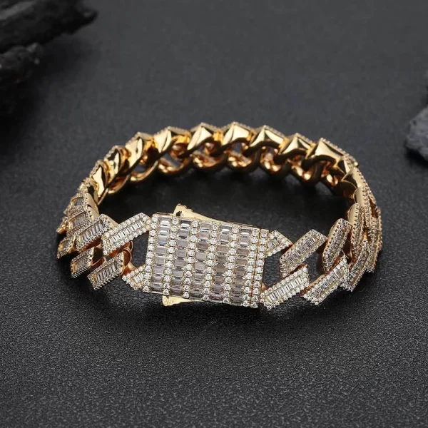 The Iced Diamond Miami Cuban Link Bracelet in Yellow Gold - 18mm delivers bold Hip Hop style with a luxurious touch. This Cuban link bracelet is adorned with prong-set VVS Simulated Diamonds for unmatched shine, while the durable Yellow Gold finish adds lasting elegance. The 18mm width ensures that this piece makes a statement, perfect for those who love to stand out with their accessories. Whether for casual or formal wear, this bracelet offers a mix of boldness and sophistication.