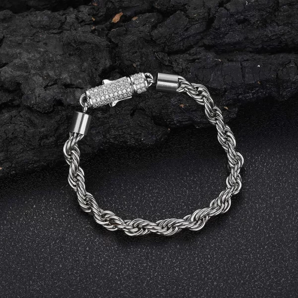 Keep it classy with the Iced Stainless Steel Rope Bracelet in White Gold - 6mm. The sleek design of this 6mm bracelet combines stainless steel durability with the sophistication of White Gold plating, making it perfect for Hip Hop lovers who want to add subtle elegance to their style.