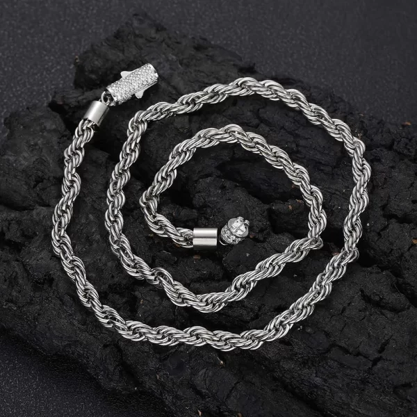 Shine bright with the Iced Stainless Steel Rope Chain in White Gold. This 6mm wide chain features a durable stainless steel construction with a sleek White Gold finish, providing both strength and style. The intricate rope design adds texture and the VVS Simulated Diamonds ensure maximum sparkle. Perfect for layering or wearing solo, this chain works seamlessly with both casual and formal outfits, making it a versatile addition to any collection.