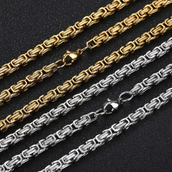 Make a statement with the Iced Cross Stainless Steel Miami Cuban Link Chain in Yellow Gold - 12mm. Featuring VVS Simulated Diamonds and a durable Stainless Steel construction, this 12mm Cuban link chain is both bold and luxurious. Its cross details add a unique touch, making it the perfect accessory for anyone looking to stand out. Whether you¡¯re dressing up or down, this chain delivers style and durability, with the Yellow Gold finish ensuring a warm, high-end shine that complements any look.