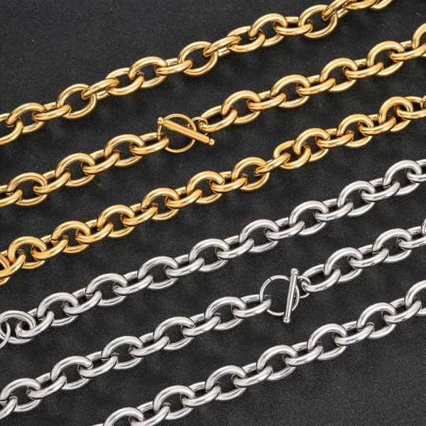 Shine bright with the Stainless Steel 18K Gold Rolo Chain in White Gold. This 12mm chain is designed to make a statement, with its thick links and premium White Gold plating. Made from durable stainless steel, it offers both strength and sophistication, making it an ideal accessory for any occasion. The White Gold finish adds a refined elegance, perfect for both casual wear and formal settings. Whether layered or worn alone, this Rolo Chain is sure to elevate your look.