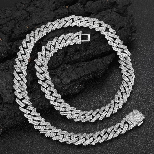 Take your chain game to the next level with the 925S Moissanite Cuban Link Chain in White Gold. This high-quality chain features VVS clarity moissanite that mimics the look of real diamonds. With a hardness rating of 9.25 out of 10, it surpasses most fake diamonds in both durability and brilliance. Paired with 925 Sterling Silver, the 12mm Cuban link offers a luxurious look without the high cost of real diamonds. Perfect for everyday wear or special occasions, this White Gold chain adds elegance and shine to any collection.