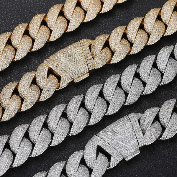 Make a powerful statement with the Iced Prong Pop Miami Cuban Link Bracelet in Yellow Gold - 24mm. This oversized bracelet is designed for those who want to stand out, featuring prong-set VVS Simulated Diamonds that give off a dazzling shine. The Yellow Gold finish adds an extra touch of luxury, ensuring durability and lasting appeal. Perfect for Hip Hop fans who love bold accessories, this 24mm bracelet is a must-have for those who want to add serious bling to their collection. Whether dressing up for a special event or looking to make a statement, this bracelet delivers.