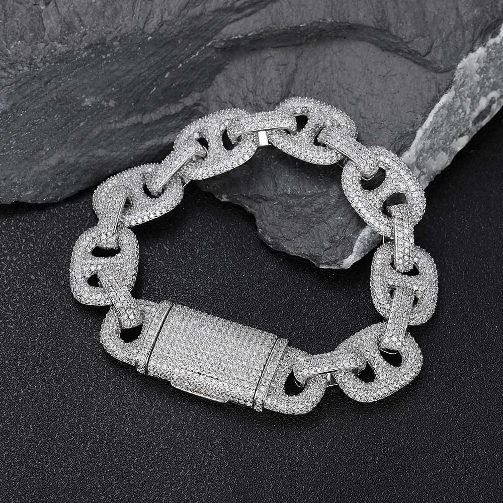 The Iced Prong Mariner Link Bracelet in White Gold - 16mm is designed for Hip Hop lovers who appreciate bold, modern jewelry. Featuring prong-set VVS Simulated Diamonds, this bracelet shines with unmatched brilliance, while the White Gold finish adds a sleek and durable touch. With its 16mm width, this bracelet is perfect for making a statement at any event, adding a bold, luxurious element to any outfit.