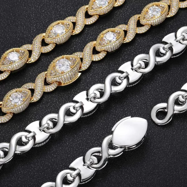 Turn heads with the Iced Infinite Eyes 8-Shaped Link Chain in White Gold. This 15mm chain features a distinctive 8-shaped design, intricately set with VVS Simulated Diamonds for a brilliant shine. The White Gold plating adds a sleek, modern twist to this bold piece, making it a versatile accessory for any occasion. Whether paired with streetwear or formal attire, the White Gold finish offers an elegant contrast that makes the chain stand out in any setting.