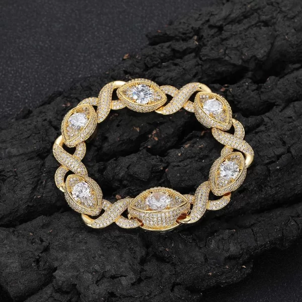 The Iced Infinite Eyes 8-Shaped Link Bracelet in Yellow Gold - 15mm offers a unique and eye-catching design for Hip Hop lovers. Featuring prong-set VVS Simulated Diamonds in an 8-shaped link, this bracelet is a bold yet luxurious statement piece. The high-quality Yellow Gold finish adds durability and a lavish touch, making this bracelet perfect for both casual and special occasions. Whether you're looking to make a statement with your jewelry or simply elevate your everyday style, this piece combines elegance with modern flair, ideal for any Hip Hop enthusiast's collection.