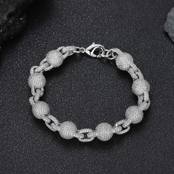 The Iced Beaded Rolo Bracelet in White Gold - 11mm offers a bold, modern twist on a classic design, featuring round beaded details and prong-set VVS Simulated Diamonds. The White Gold finish adds a refined touch, ensuring both durability and a luxurious feel. Ideal for Hip Hop fans who want to add a touch of sophistication to their style, this 11mm bracelet is versatile enough for both casual and formal occasions. It stands out as a unique accessory, perfect for those who want a balance of elegance and edge.