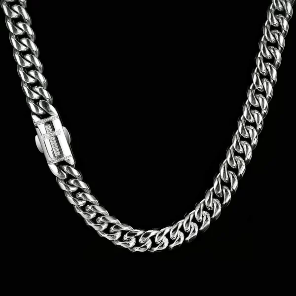 Step up your style with the Iced Prong Miami Cuban Link Chain in White Gold - 10mm. This 10mm chain features prong-set VVS Simulated Diamonds that shine brilliantly, while the White Gold finish adds a sleek, modern touch. Perfect for both casual wear and formal events, this chain guarantees to make a statement. Whether worn solo or layered, this White Gold piece is the perfect addition to any collection.