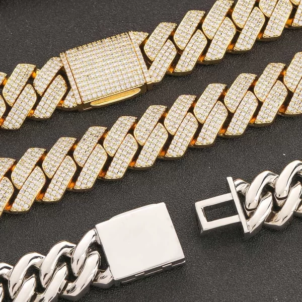 Make a statement with the Iced Diamond Miami Cuban Link Chain in Yellow Gold. This bold, 20mm wide chain is plated in Yellow Gold, offering a stunning blend of luxury and durability. Featuring dazzling VVS Simulated Diamonds meticulously cut for high refractive brilliance, this chain shines bright in any light. Whether you're dressing up for an event or adding flair to your streetwear, this piece delivers. The rich Yellow Gold finish ensures it remains a standout accessory, perfect for anyone wanting to elevate their style without compromising on quality.