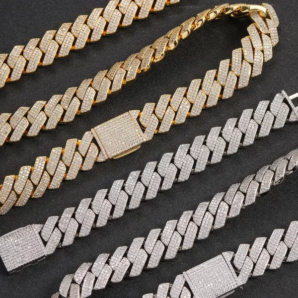 Make a bold statement with the Iced Diamond Miami Cuban Link Chain in White Gold. This 20mm wide chain, plated in sleek White Gold, features VVS Simulated Diamonds that catch the light with every movement. The combination of the chain's bold width and the cool, luxurious White Gold plating offers a refined yet modern aesthetic. Whether you're hitting the streets or attending a formal event, this chain brings both class and shine, perfect for those seeking a versatile piece to add to their wardrobe.