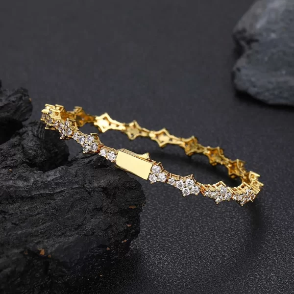 Add a touch of faith and bling to your collection with the Iced Cross Tennis Bracelet in Yellow Gold - 7mm. Featuring a row of VVS Simulated Diamonds and a cross motif, this bracelet delivers unmatched sparkle and symbolism. The 7mm width adds a bold element to any outfit, while the Yellow Gold Plating ensures durability and shine. Perfect for those looking to blend style with a meaningful statement.