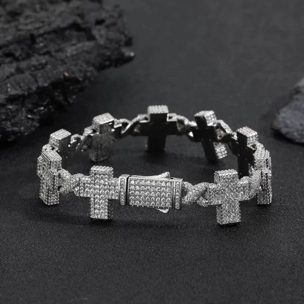 The Iced Cross 8-Shaped Link Bracelet in White Gold - 17mm brings together the perfect blend of style and luxury for Hip Hop enthusiasts. Featuring VVS Simulated Diamonds and an 8-shaped cross link design, this bracelet is finished in White Gold for a sleek, high-end look. Whether worn layered or solo, this piece ensures a bold, standout presence for both casual and formal Hip Hop fashion.