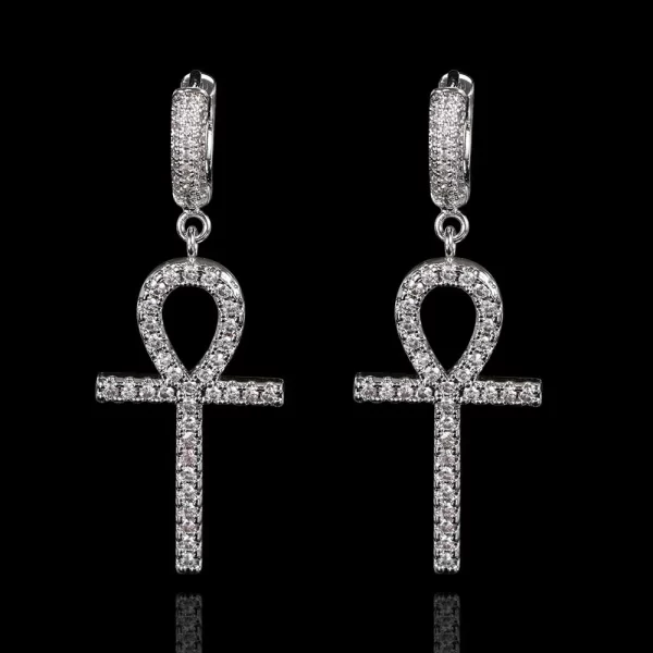 The Iced Ankh Cross Hanging Earrings in White Gold offer a modern twist on an ancient symbol. With a sleek White Gold-plated finish and shining simulated diamonds, these earrings are designed for those who love to mix fashion with meaning. Ideal for Hip Hop lovers looking to add both elegance and cultural symbolism to their jewelry collection.