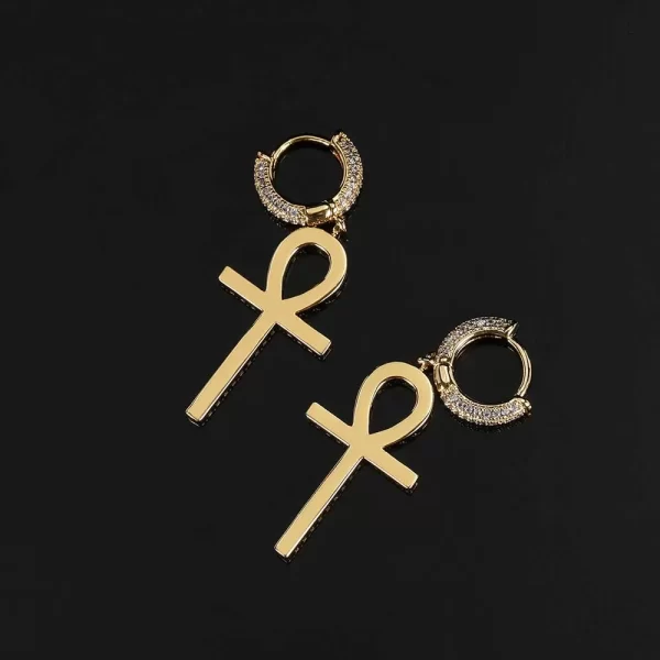 Make a bold statement with these Iced Ankh Cross Hanging Earrings. The iconic Ankh cross symbolizes life, and with the gold-plated finish and simulated diamonds, these earrings deliver a unique blend of style and meaning. Perfect for adding that bling touch to any outfit, whether casual or formal, these earrings bring both spirituality and Hip Hop luxury to your look.