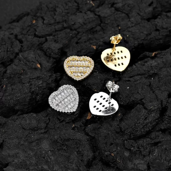 Spread the love with these Iced Heart Stud Earrings. The heart-shaped design, combined with the gold-plated finish and sparkling simulated diamonds, makes these earrings perfect for special occasions or just adding some romance to your everyday look. Whether you're dressing up or keeping it casual, these heart studs bring that Hip Hop charm with a touch of elegance.