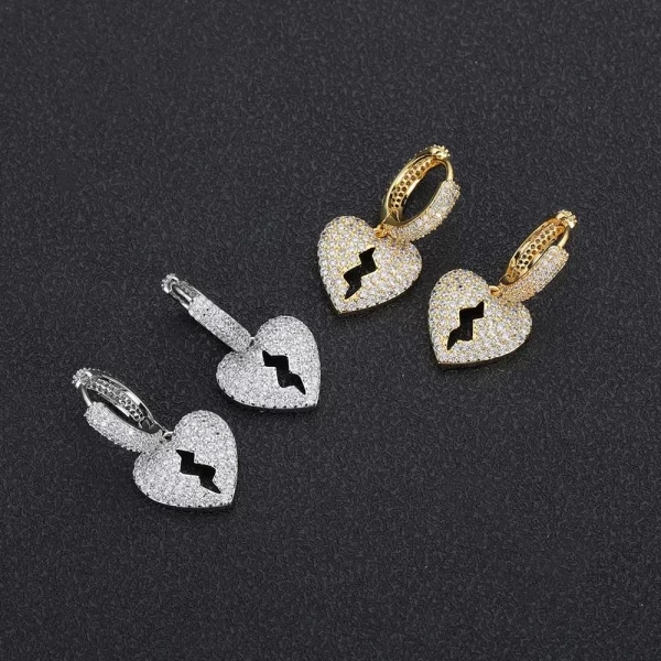 The Iced Heartbroken Stud Earring in White Gold offers a more refined take on the classic heartbroken design. Featuring diamond-simulated stones that sparkle with every movement, this piece is both elegant and bold. Its White Gold finish ensures a luxurious feel, perfect for adding a touch of sophistication to your Hip Hop-inspired look, whether for casual wear or a statement outfit.