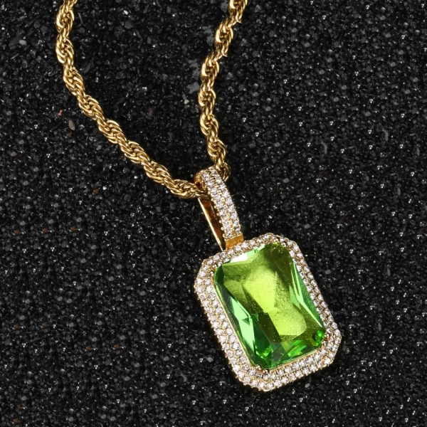 Brighten up your Hip Hop collection with the Yellow Gold Peridot Stone Pendant. Featuring a vibrant green peridot gemstone framed by VVS simulated diamonds, this pendant is set in a Yellow Gold-plated frame, adding a pop of color and luxury to any outfit. Hypoallergenic and water-resistant, it's perfect for daily wear or special occasions. The peridot’s refreshing color paired with the warm Yellow Gold finish creates a bold yet elegant accessory that complements both casual and formal looks.