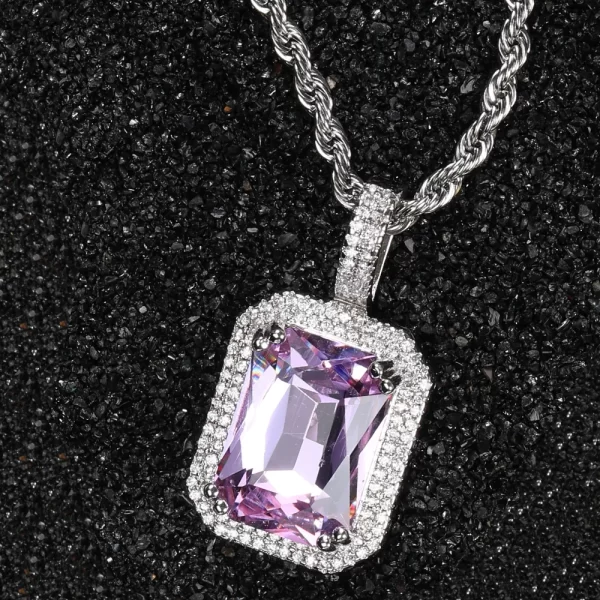 Bring a modern edge to your jewelry with the White Gold Amethyst Stone Pendant. Featuring a rich purple amethyst gemstone encased in VVS simulated diamonds, the White Gold-plated frame offers a sleek and contemporary feel. Hypoallergenic and crafted for durability, this pendant is perfect for everyday wear or special occasions. The combination of the gemstone’s vibrant color and the cool White Gold finish makes this pendant a standout piece for anyone looking to elevate their Hip Hop style.