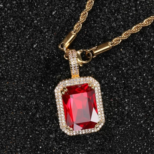 Turn heads with the Yellow Gold Ruby Stone Pendant, a striking piece designed to add bold color to your Hip Hop jewelry collection. Featuring a radiant ruby stone surrounded by VVS simulated diamonds, this pendant offers a vibrant twist on classic elegance. Plated in Yellow Gold, it’s hypoallergenic and durable, ensuring comfort and long-lasting wear. Whether worn to elevate casual outfits or to make a statement at formal events, the Yellow Gold finish and luxurious red gemstone create a standout combination that’s sure to impress.