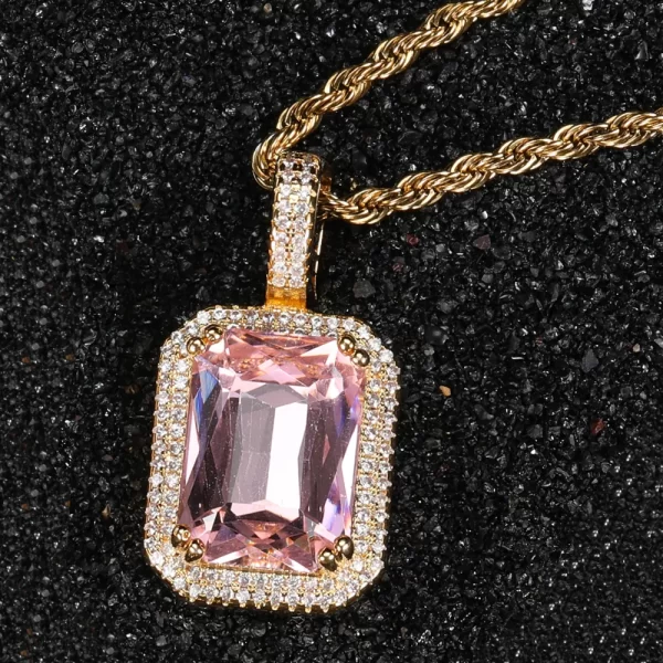 Bring a touch of femininity to your Hip Hop collection with the Yellow Gold Pink Stone Pendant. This delicate piece features a pink gemstone surrounded by VVS simulated diamonds, all set in a Yellow Gold-plated design. Hypoallergenic and built for long-lasting wear, this pendant is both stylish and durable, perfect for adding a subtle yet undeniable pop of color to any outfit. Whether dressing up for an event or keeping it casual, the Yellow Gold finish ensures this pendant remains a timeless addition to your jewelry box.