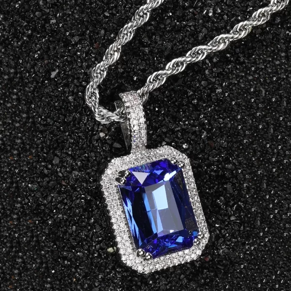 For a cooler, more modern look, the White Gold Sapphire Stone Pendant offers the same royal elegance with a sleek, contemporary twist. Featuring a vivid blue sapphire gemstone framed by VVS simulated diamonds, the White Gold-plated setting gives this pendant a refined, yet bold feel. Hypoallergenic and durable, it’s ideal for both casual and formal occasions, bringing luxury and sophistication to any outfit. The White Gold finish complements the gemstone’s brilliance, making it a versatile addition to your Hip Hop jewelry collection.